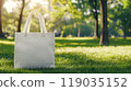 Eco bag mockup on green grass in a park 119035152