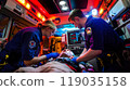 Two paramedics performing CPR on a patient inside a moving ambulance, bright interior lights, medical equipment all around 119035158