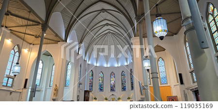 Beautiful Church and altar, breathtaking view of a cathedral church featuring stunning elegant altar decoration and elegant cross Beautiful Church and altar, breathtaking view of a cathedral church featuring stunning elegant altar decoration and elegant cross 119035169