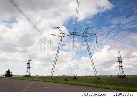 High voltage power line in a field 119035355