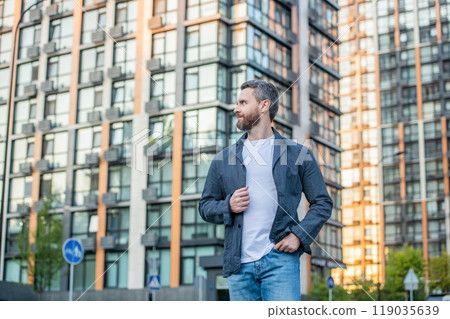 adult man outside, banner. photo of adult man in white shirt. adult man outdoor. adult man outside, banner. photo of adult man in white shirt. adult man outdoor. 119035639