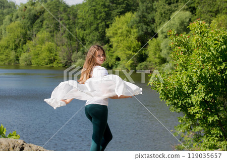 Young woman with white cloth 119035657