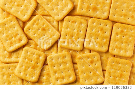 Cheese crackers background, crispy and crunchy cheese crackers, taken from above, close up. 119036383