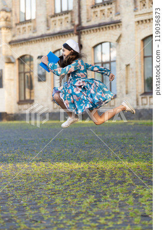 Education in school. Girl student jump outdoor. September 1. Time to study. Knowledge and education. School education. Students life. Teen girl jumping back to school. Knowledge day. Advertisement Education in school. Girl student jump outdoor. September 1. Time to study. Knowledge and education. School education. Students life. Teen girl jumping back to school. Knowledge day. Advertisement 119036873