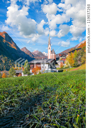 Amazing autumn landscape  at Heiligenblut with St Vincent Church near Grossglockner mount . 119037268