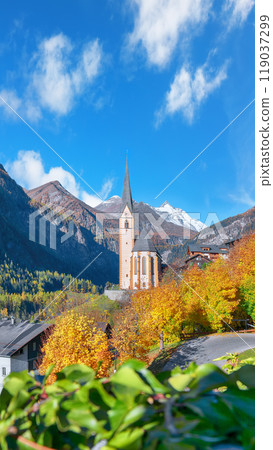 Astonishing autumn landscape at Heiligenblut with St Vincent Church near Grossglockner mount . Astonishing autumn landscape at Heiligenblut with St Vincent Church near Grossglockner mount . 119037299