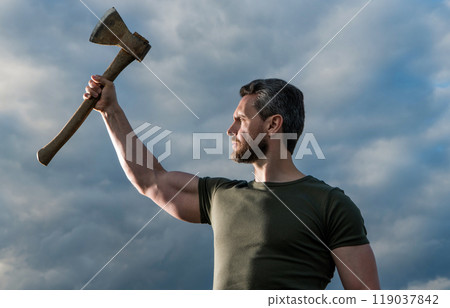 confident man with axe. free caucasian man hold ax. brutal man on sky background 119037842