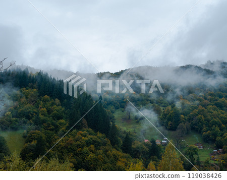 Village Transcarpathia region scenic Carpathian mountains view Ukraine Europe Autumn countryside landscape Lush foliage 119038426