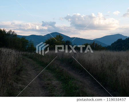 Village in Transcarpathia region scenic Carpathian mountains view Ukraine Europe Autumn countryside landscape Evening 119038437
