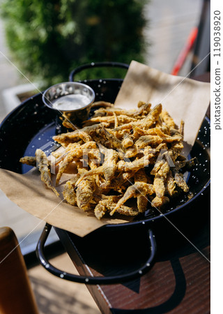 Crispy fried seafood bites served with dipping sauce. Snack for seafood lovers and food enthusiasts 119038920
