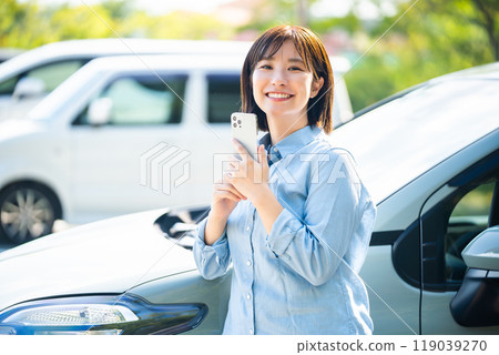 A woman driving a car A woman going for a drive 119039270