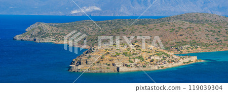Overlooking Spinalonga Island and the peninsula behind it from a high vantage point (Crete, Greece) 119039304