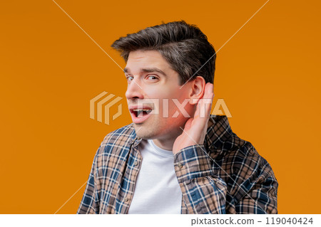 Curious 30s handsome man doesn't hear,asking what.Quiet sound,deaf,misunderstand Curious 30s handsome man doesn't hear,asking what.Quiet sound,deaf,misunderstand 119040424
