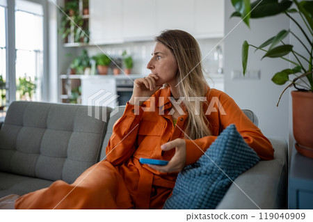 Thoughtful woman looking in distance think about problems lost in thoughts, consider life troubles. 119040909