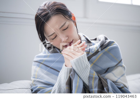 Close-up of a woman suffering from rough, dry hands Close-up of a woman suffering from rough, dry hands 119043463