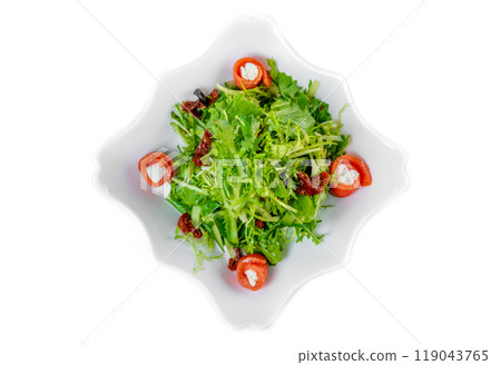 Fresh salad with arugula, salmon, cream cheese and sun-dried tomatoes on white background Fresh salad with arugula, salmon, cream cheese and sun-dried tomatoes on white background 119043765