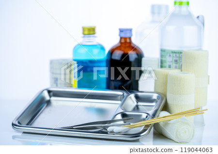 Medical equipment for treating infections. Wound care dressing set. Medical supplies for nurses. Conform bandage, forceps, cotton stick, alcohol. Sterile dressing materials. Healthcare equipment. Medical equipment for treating infections. Wound care dressing set. Medical supplies for nurses. Conform bandage, forceps, cotton stick, alcohol. Sterile dressing materials. Healthcare equipment. 119044063