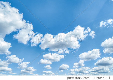 Beautiful blue sky and white cumulus clouds abstract background. Cloudscape background. Blue sky and fluffy white clouds on sunny days. Blue sky and daylight. World Ozone Day. Ozone layer. Summer sky. 119044091