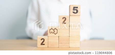 2025 year block with jigsaw puzzle icon. Business Process, Team, teamwork, Goal, mission, Resolution, strategy, plan, Action, partnership, and New Year start 2025 year block with jigsaw puzzle icon. Business Process, Team, teamwork, Goal, mission, Resolution, strategy, plan, Action, partnership, and New Year start 119044806