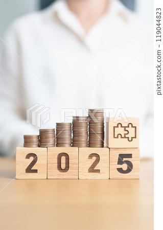 Happy New Year 2025 with Coins stack and jigsaw puzzle icon. business Process, Team, teamwork, Strategy, goal, Money, Budget, investment, financial and New Year Resolution concept 119044823