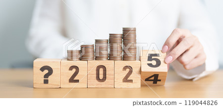 2024 to 2025 New year with questions mark icon and coins stack. Interest rate, GDP, stocks market, financial, deflation and Inflation, mortgage, debt, Loan and Economic Recession 2024 to 2025 New year with questions mark icon and coins stack. Interest rate, GDP, stocks market, financial, deflation and Inflation, mortgage, debt, Loan and Economic Recession 119044826