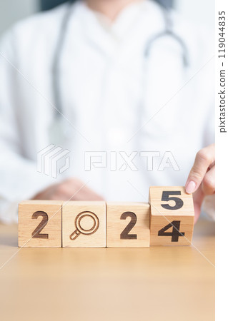 2024 end year to Happy New Year 2025 with Smile block against doctor. Health, Healthcare insurance, medical Satisfaction, feedback, Review, mental health, wellbeing, wellness and good year concept 119044835