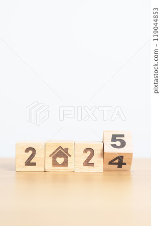 2024 end year to Happy New Year 2025 with Home and Heart block. Property investment, House Mortgage, Real Estate tax, homeless, donation, Financial and happy family concepts 119044853