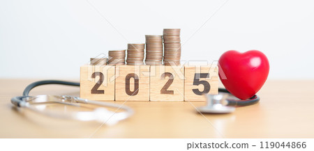 Happy New Year 2025 with doctor Stethoscope, coins stack and red heart on table. health care, Money saving, Goal, Resolution, health Insurance, Wellness and medical concept Happy New Year 2025 with doctor Stethoscope, coins stack and red heart on table. health care, Money saving, Goal, Resolution, health Insurance, Wellness and medical concept 119044866