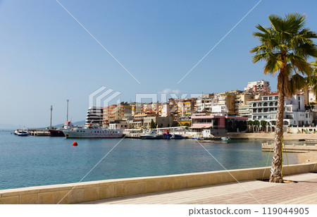 Sarande cityscape on Ionian Sea with residential area and harbor Sarande cityscape on Ionian Sea with residential area and harbor 119044905