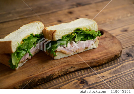 Chicken ham and lettuce sandwich 119045191