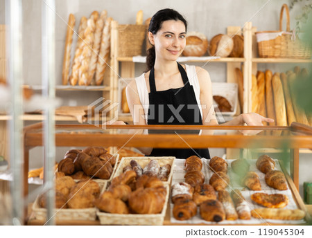 Armenian young woman work selling in family bakery shop 119045304