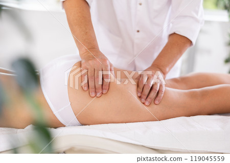 anti-cellulite massage close-up anti-cellulite massage close-up 119045559
