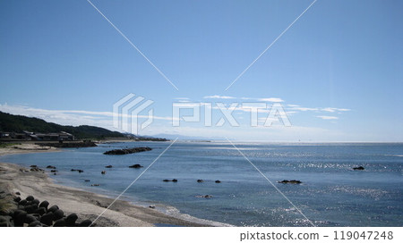 A rural landscape with blue skies, the blue Sea of Japan, a cape and a sandy beach A rural landscape with blue skies, the blue Sea of Japan, a cape and a sandy beach 119047248