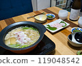 A dinner table with a hotpot of spotted grouper 119048542
