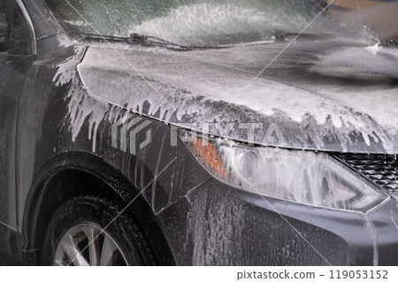 SUV Being Washed at Car Wash SUV Being Washed at Car Wash 119053152