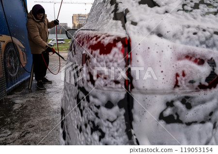 SUV Being Washed at Car Wash SUV Being Washed at Car Wash 119053154