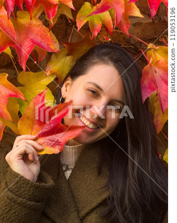 Stylish Woman in Autumn Foliage Stylish Woman in Autumn Foliage 119053196