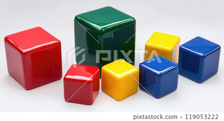Vibrant colorful cubes of various sizes on white background for creative design and decoration 119053222