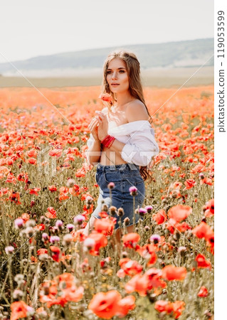 Woman poppies field. Side view of a happy woman with long hair in a poppy field and enjoying the beauty of nature in a warm summer day. Woman poppies field. Side view of a happy woman with long hair in a poppy field and enjoying the beauty of nature in a warm summer day. 119053599