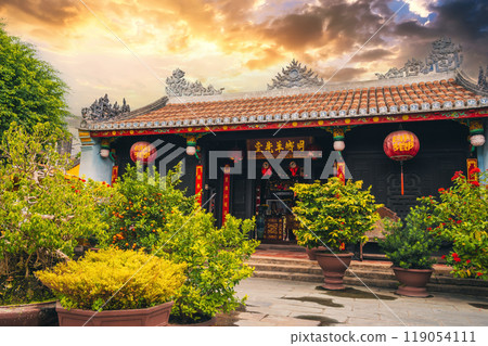 Beautiful Asian Vietnamese temple on Buddhist pagoda in old town in Hoi An in Vietnam in Asia at sunset in summer Beautiful Asian Vietnamese temple on Buddhist pagoda in old town in Hoi An in Vietnam in Asia at sunset in summer 119054111