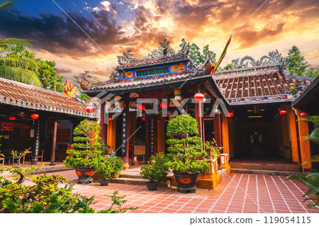 Beautiful Asian Buddhist temple on Vietnamese pagoda in the old town in Hoi An in Vietnam in Asia at sunset in summer Beautiful Asian Buddhist temple on Vietnamese pagoda in the old town in Hoi An in Vietnam in Asia at sunset in summer 119054115