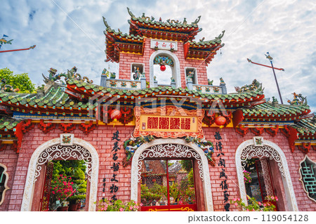 ancient red Asian gate to the Hoi Quan Phu Kien Buddhist pagoda in old town in Hoi An in Vietnam in Asia 119054128