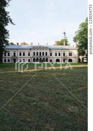 Park with new castle in Zywiec city in Poland - vertical 119054755