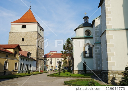 Co-Cathedral and bell tower in Zywiec city in Poland Co-Cathedral and bell tower in Zywiec city in Poland 119054773