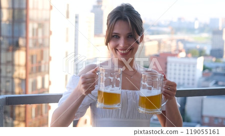 Beautiful woman holding 2 mugs with cold fresh beer. Oktoberfest celebration concept. Beautiful woman holding 2 mugs with cold fresh beer. Oktoberfest celebration concept. 119055161