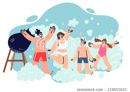 Foam party for family visiting aqua park, dancing near cannon to create foam and cheer up kids Foam party for family visiting aqua park, dancing near cannon to create foam and cheer up kids 119055631