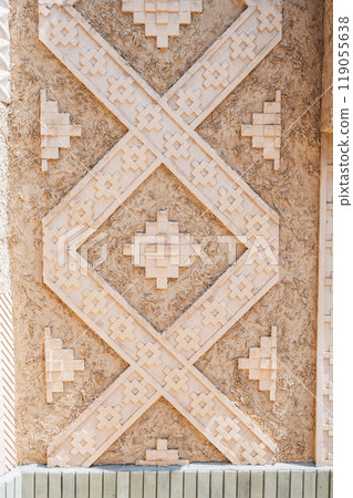 Carved stone pattern of the traditional wall decoration of an Arab building. Carved stone pattern of the traditional wall decoration of an Arab building. 119055638