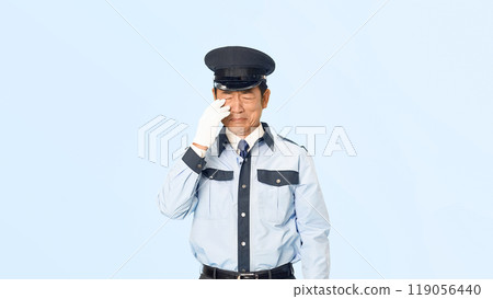 Crying male security guard 119056440