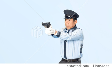 Male police officer holding a pistol 119056466