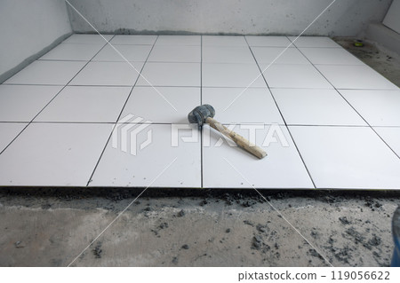 Tile floor construction and tool. 119056622